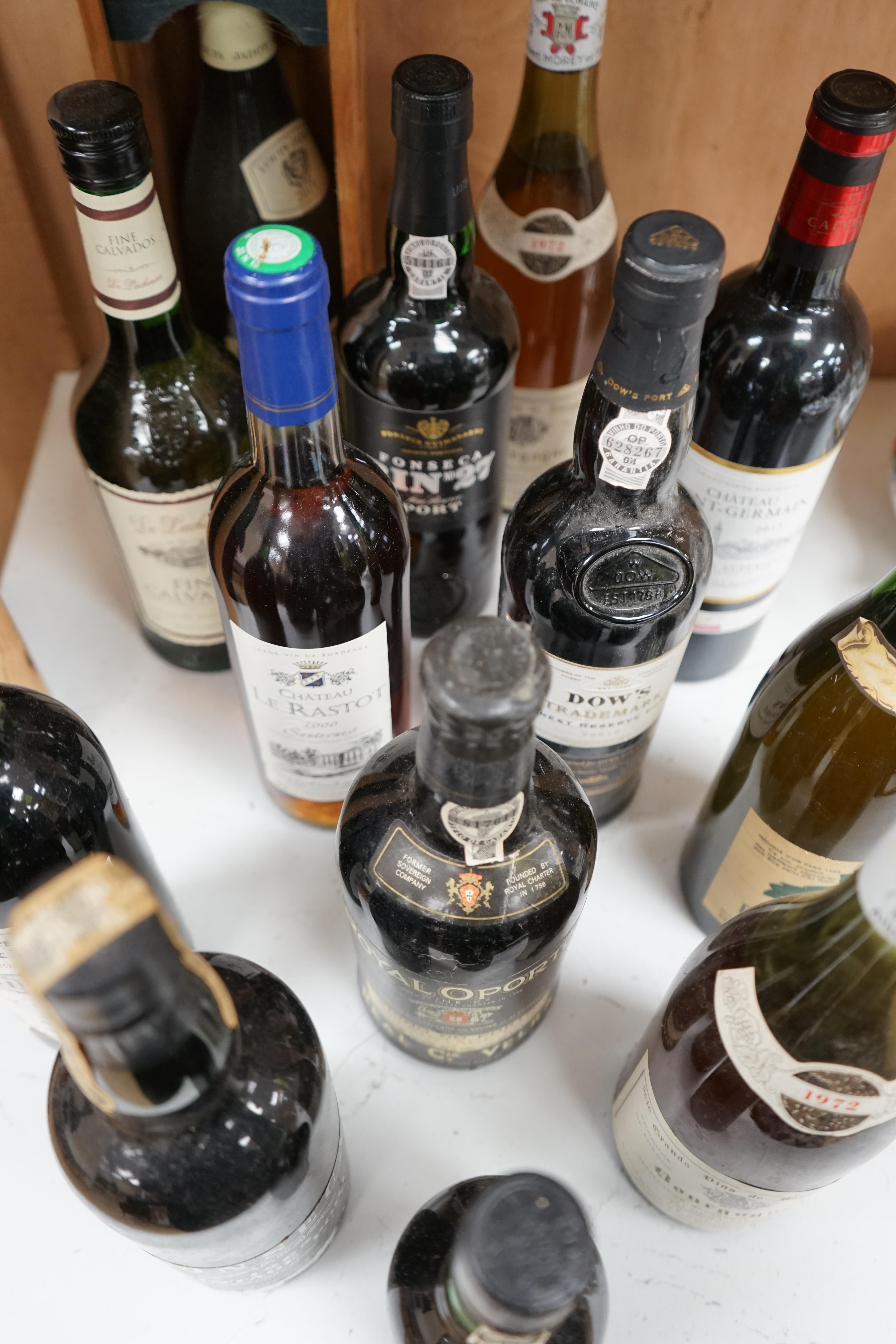 Seven bottles of mixed wines including St Emilion, Sauternes, Bordeaux, together with five bottles of mixed ports including Dow’s and two bottles of Fonseca port and a bottle of Calvados. Condition - unknown storage.